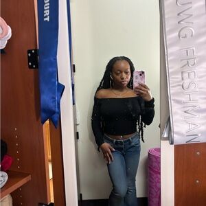 Black Off-Shoulder Top and Blue Jeans